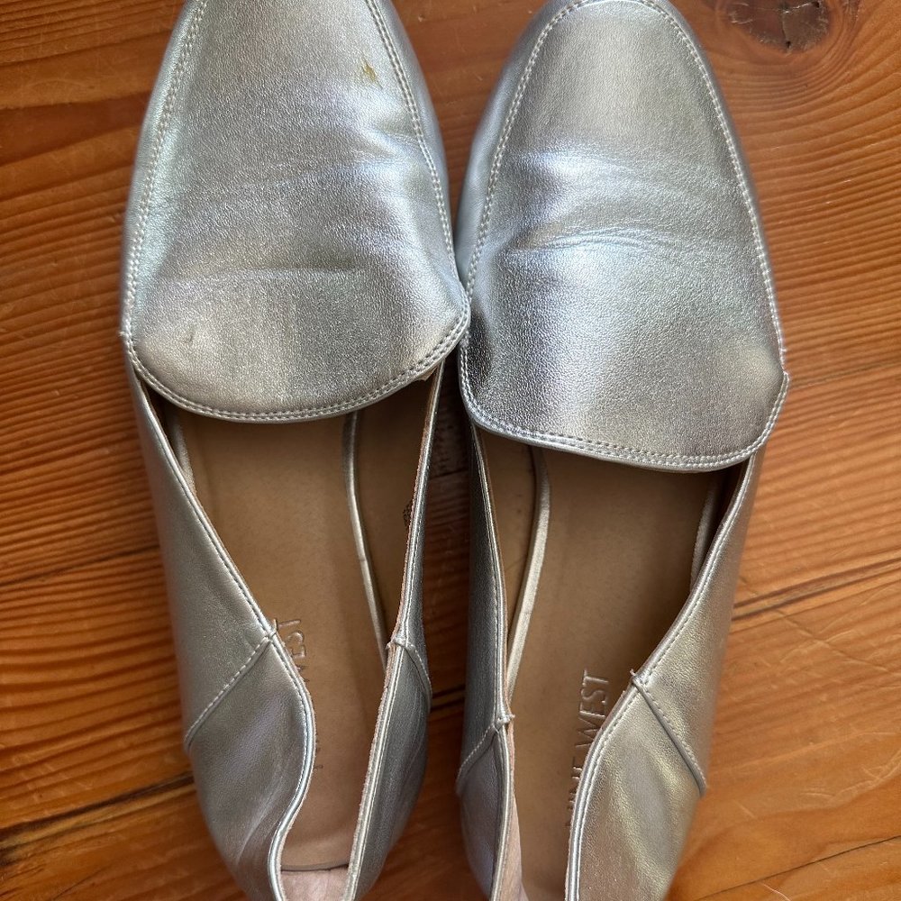Used Nine West silver loafers, size 8 1/2